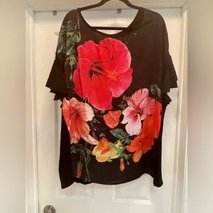 Beautiful stylish black top with bright orange and red flowers. Size 3X